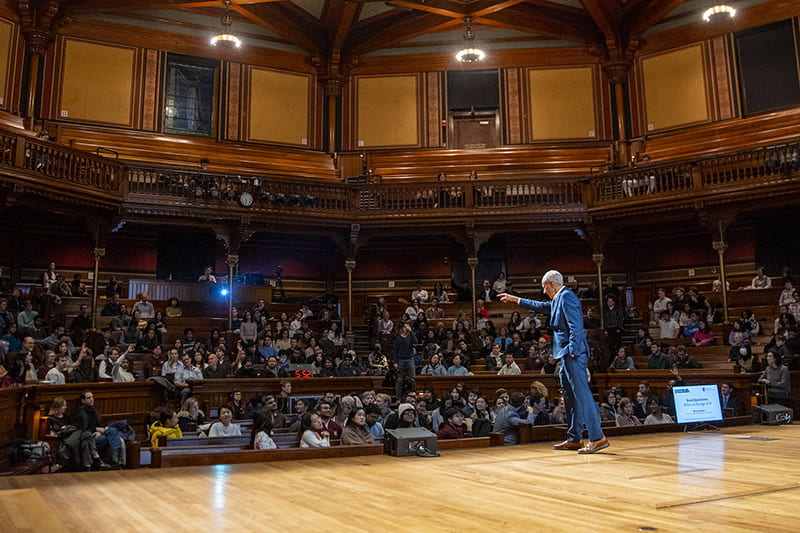 Michael Sandel at Sanders Theater giving a talk on AI