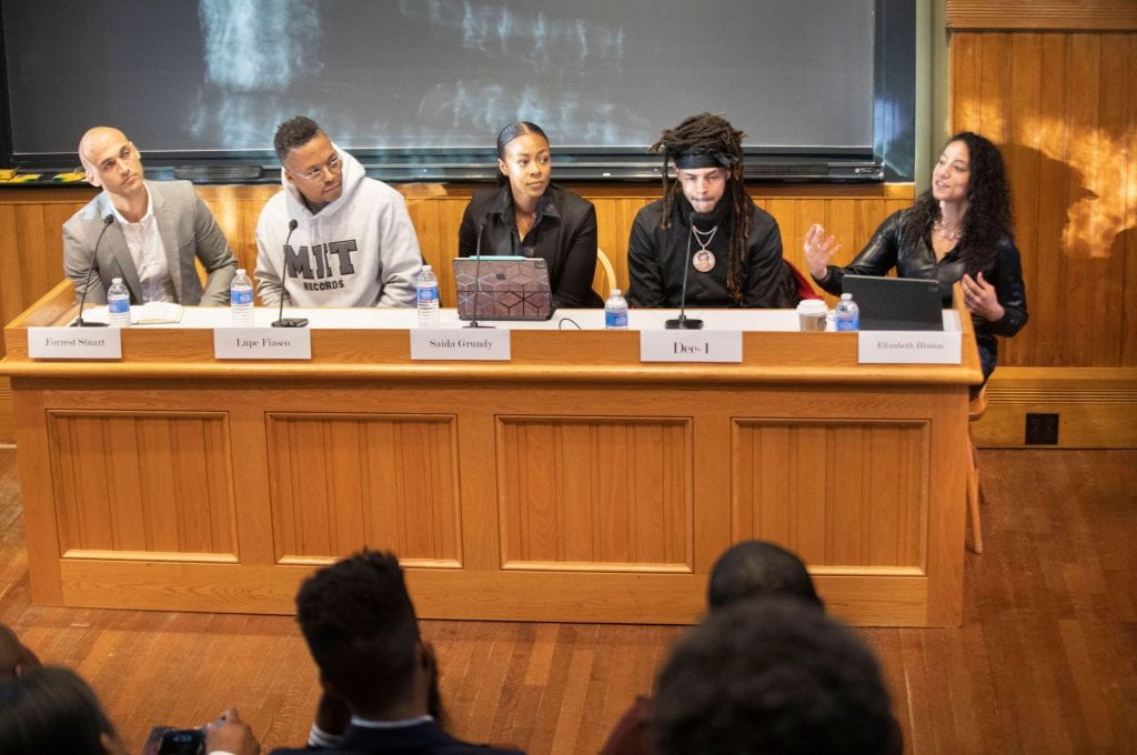 Forrest Stuart, Stanford University, (from left) Lupe Fiasco, MIT, Saida Grundy, Boston University, Dee-1, Harvard University, and Elizabeth Hinton, Yale University speak during Generational Drill: Violence, Art & the Future of Hiphop inside Sever Hall. The event was presented by the Institute on Policing, Incarceration, & Public Safety at the Hutchins Center, 
