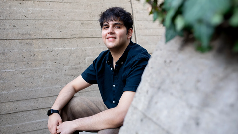 Muqtader Omari sitting